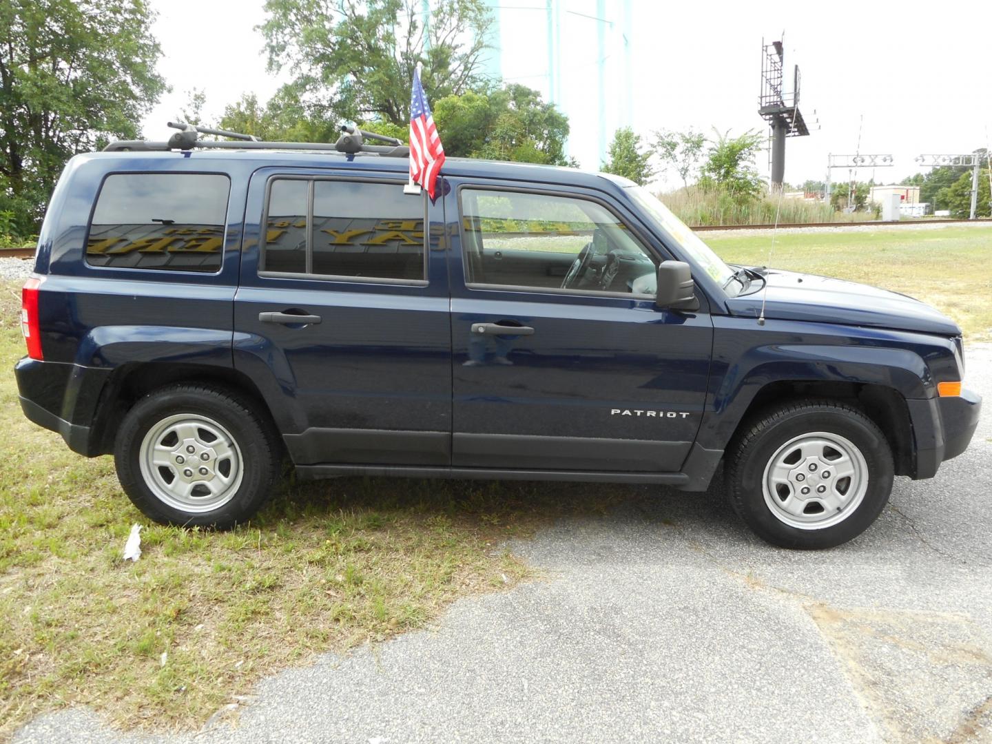 2014 Blue Jeep Patriot Sport 2WD (1C4NJPBA5ED) with an 2.0L L4 DOHC 16V engine, located at 2553 Airline Blvd, Portsmouth, VA, 23701, (757) 488-8331, 36.813889, -76.357597 - Photo#4